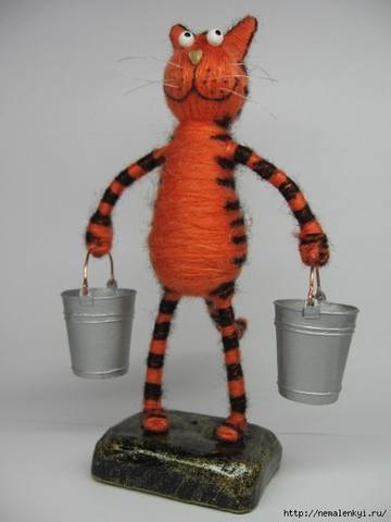 Кошки из проволоки Кошки из проволоки