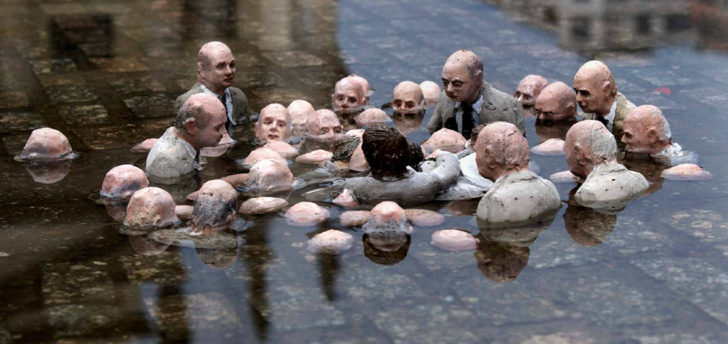 Группа скульптур в Берлине Политики обсуждают глобальное потепление