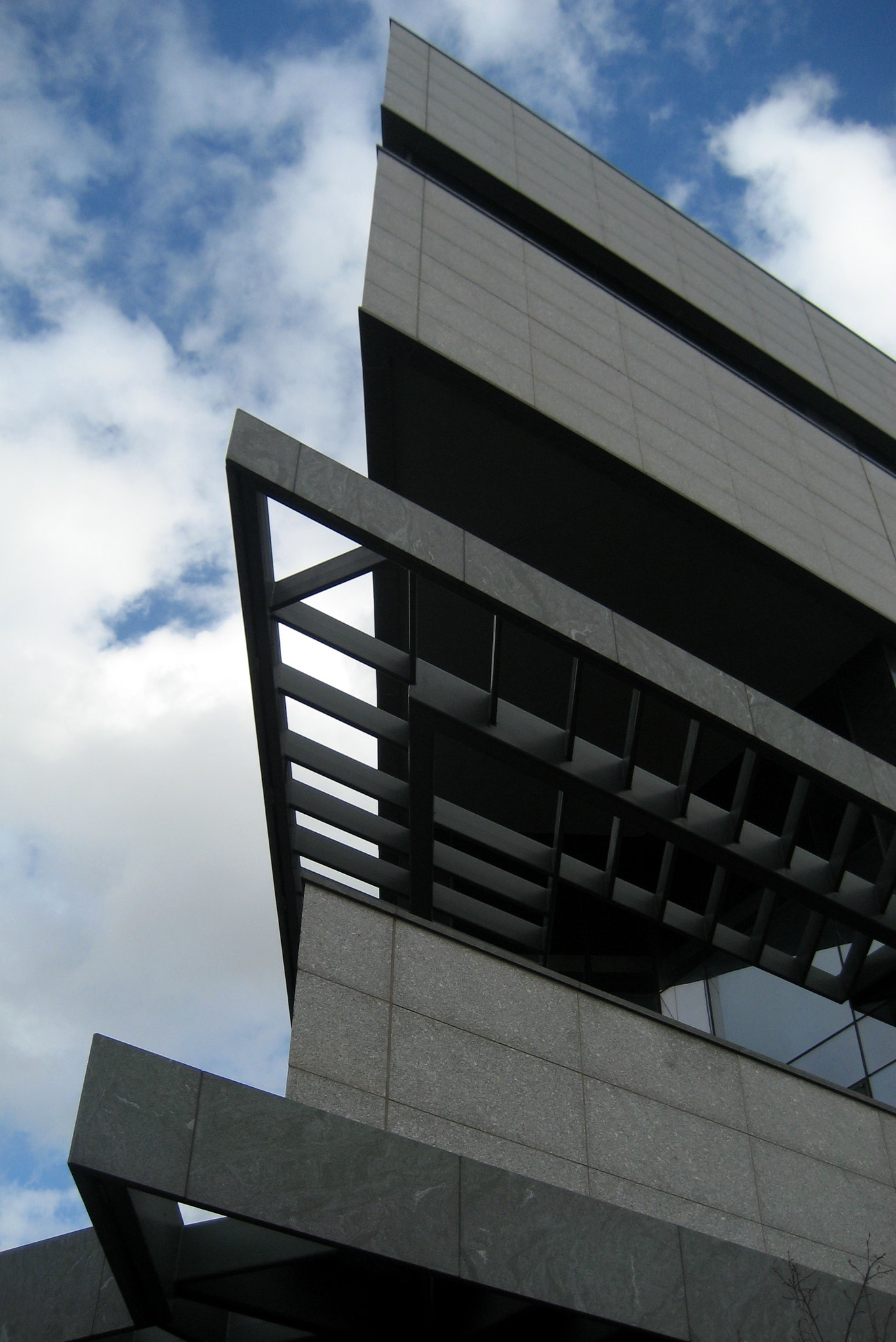 NYC - Battery Park City: Museum of Jewish Heritage – A Living Memorial to the Holocaust The Museum of Jewish Heritage, located at 36 Battery Place in battery Park City, opened in 1997 as a living memorial to the Holocaust. The museum's $21.5 million core building was designed by Kevin Roche of Roche-Dinkeloo. The core building features a six-sided shape and a six-tiered, louvered roof rising 85 feet in the air, which are reminiscent of the six-pointed Star of David and symbolic of the six million Jews who perished in the Holocaust. The four-story Robert M. Morgentheau Wing opened in 2003, adding 82,000-square feet of exhibition space and Andy Goldsowrth's Garden of Stones.
