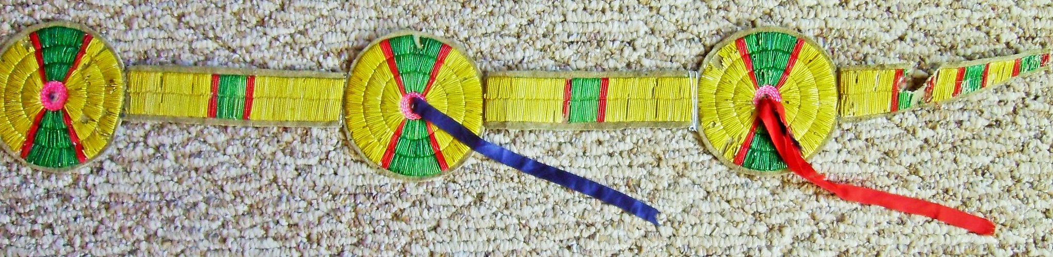 031 Quill strip yellow quilled blanket strip 56" long, disks are 5" in diameter