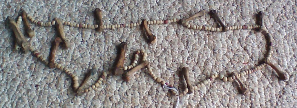 060 finger bone necklace 23" long