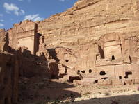 Petra Some of the many tomb facades that can be seen all over Petra, probably dating from the 1st century BC. These combine architectural characteristics unique to Nabatean Petra, with classical facades surmounted by step-like motifs, distinctly more eastern forms.