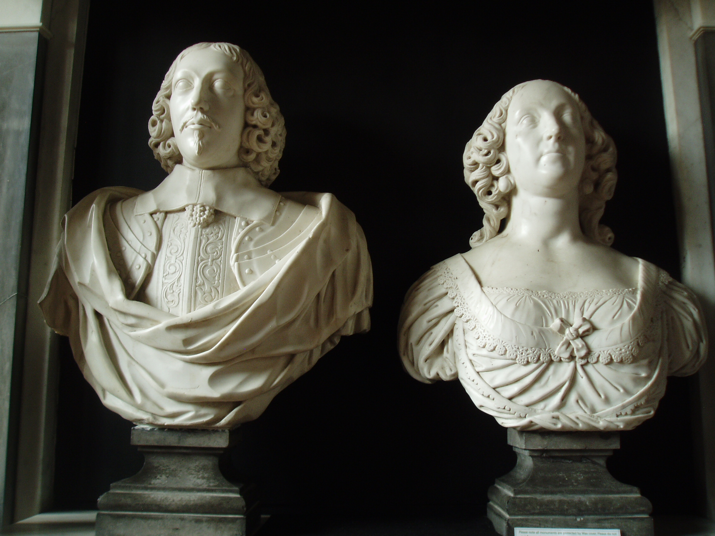 Peyto Busts Detail of monument to Edward Peyto (d.1643) and his wife, apparently by Nicholas Stone's son John, 1643. St Giles is a long low building mostly dating from the 14th and 15th centuries. It's interior has a tunnel-like effect, there being little structural difference between nave and chancel, all one long chamber without aisles, separated only by a modest screen. It's most important features are the group of monuments at the west end of the nave, all to members of the Peyto family, builders of the renowned windmill nearby, and former occupants of the now vanished mansion that stood immediately north of the church (built 1650-60, demolished 1802; only an impressive gateway arch remains).