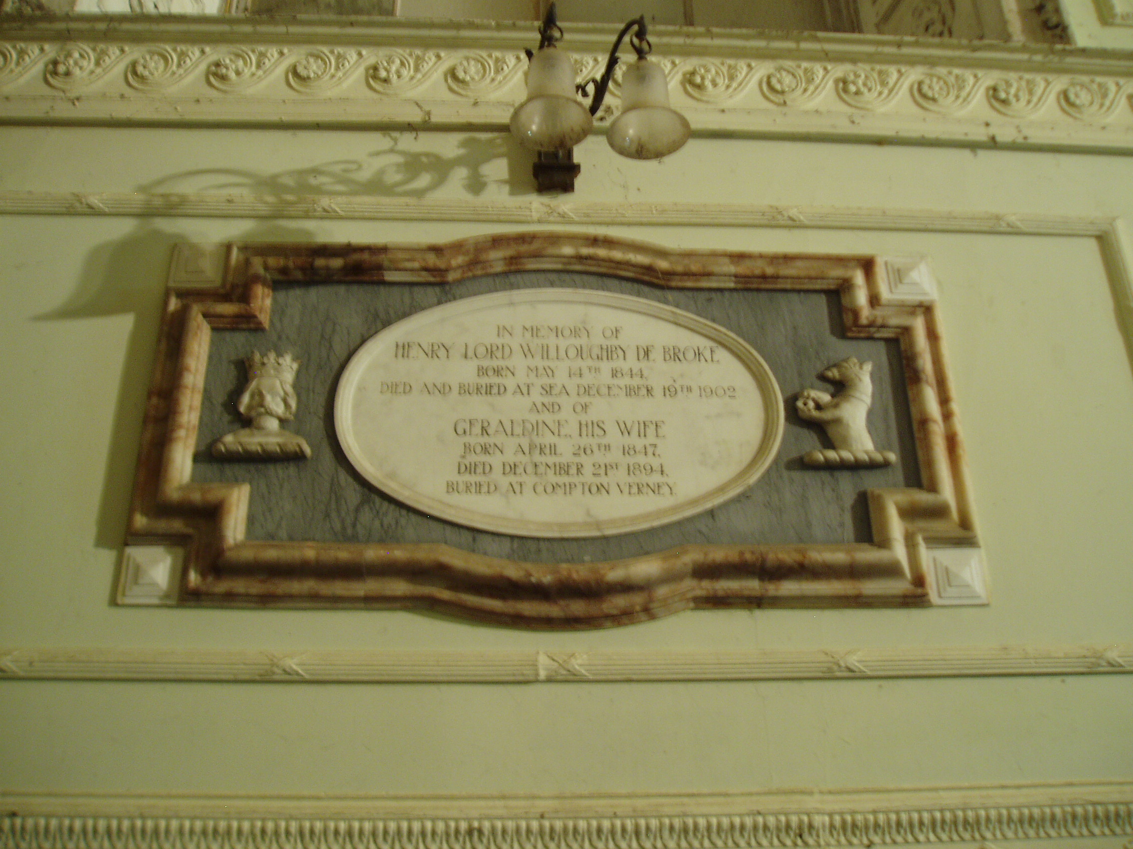 Wall Tablet Compton Verney's Chapel was built in 1772 by Lancelot 'Capability' Brown to replace the medieval church that stood by the lake nearby. It has not been used for services since the Verney family left in 1921. Inside the rectangular room has plaster decoration influenced by Robert Adam's work. The main items of interest are the Verney monuments including a large centrally placed tomb with effigies of Sir Richard & wife by Nicholas Stone c1630. However given the long term disuse of the building most of the monuments have been boxed in for protection. They will remain hidden until funding is found to restore and re-open the chapel as part of the visitor attraction here, The 16th century glass once contained here was sold in the 1920s and is now in New York. Nobody seems to know what's become of the brasses. They may still be there under all the clutter that the building's mothballed state has generated. Compton Verney House stands in a beautiful setting overlooking a lake. The grounds were landscaped by Capability Brown who also built the chapel. The House itself is largely the work of Robert Adam, who in the 1760s who added extra ranges to an existing west range of 1714, From the early 20th century the house passed through various owners, and after requisitioning in World War II was never lived in again, and thus remained in a state of disuse, slowly falling apart, until rescued and converted into a highly successful art gallery in the 1990s. www.comptonverney.org.uk/?page=home The house is now almost fully restored and in use. The chapel however remains closed and awaits proper restoration.