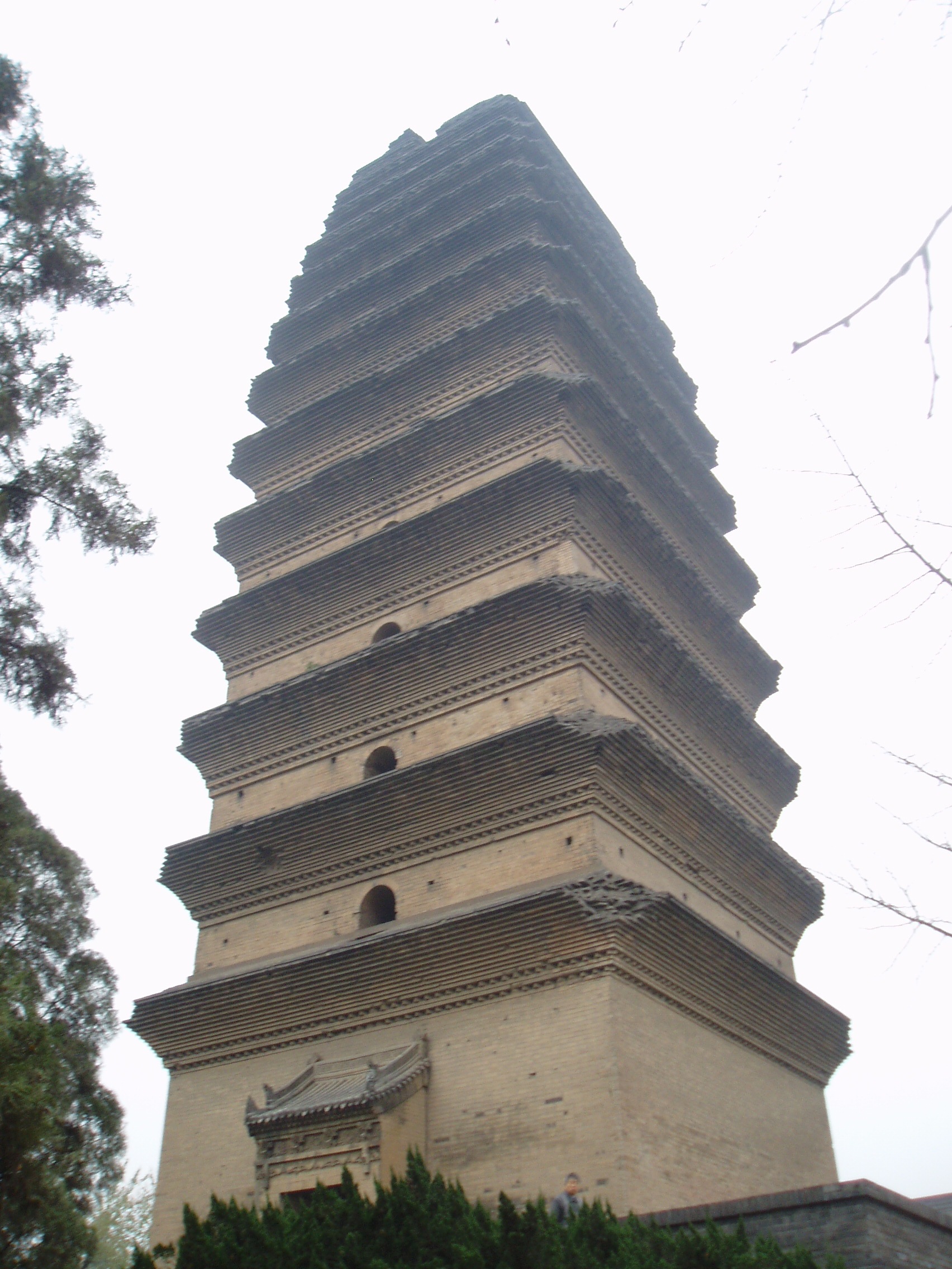 Small Wild Goose Pagoda, Xi'an The Small Wild Goose Pagoda in Xi'an is one of the city's more ancient Tang Dynasty monuments, dating from 709, the tower was built to house Buddhist scriptures brought back from India. It was damaged by several earthquakes in the medieval period, one of which caused a large fissure to open through it's centre, another later caused it to close again! There are several buildings surviving in the complex from the ancient temple that stood here, along with many animal sculptures. www.travelchinaguide.com/attraction/shaanxi/xian/small_go...