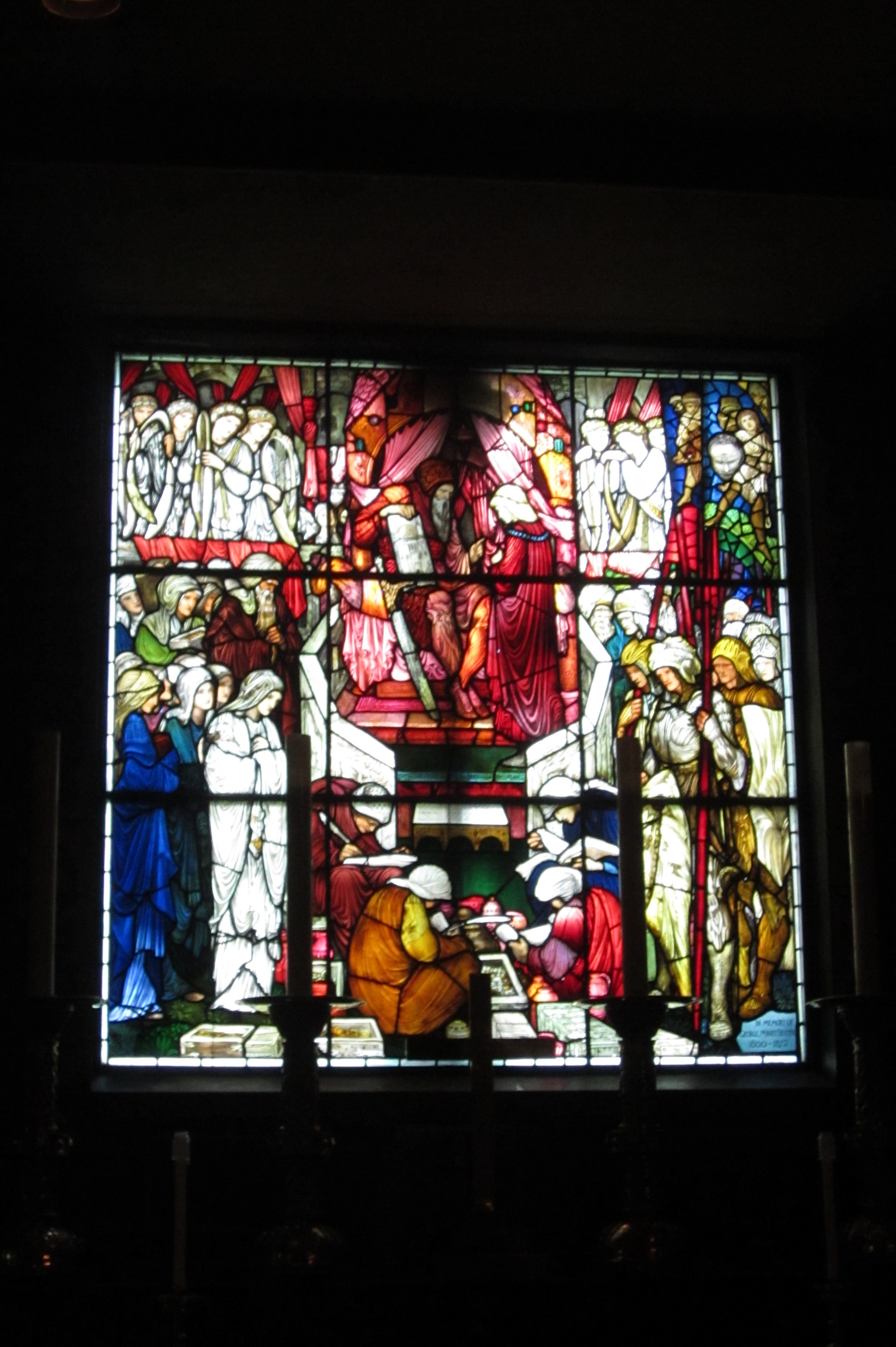 Boston - Back Bay: Trinity Church - David's Charge to Solomon David's Charge to Solomon was designed by pre-Raphaelite painter Edward Burne-Jones and executed by William Morris Studios in 1882. Trinity's stained glass collection is one of the finest in the nation with examples from most of the major American and European stained glass stuios of the nineteenth century. With the exception of one window, the church contained only clear glass windows at tits consecration. Twenty four figurative windows followed within five years. Today thirty-six windows line the walls of Trinity church, including four designed by Edward Burne-Jones and executed by William Morris and another four designed by John La Farge, who used a revolutionary style of layering opalescent glass. Trinity Church, at 206 Clarendon Street, was built from 1873 to 1876 by Henry Hobson Richardson. The Episcopal parish, founded in 1733, originally worshipped on Summer Street until it was destroyed in the Great Fire of 1872. Under the direction of Rector Phillips Brooks, Hobson was commissioned to design a replacement in Copley Square. Trinity Church helped establish Richardson's reputation, becoming the birthplace and archetype of the Richardsonian Romanesque style, characterized by a clay roof, polychromy, rough stone, heavy arches, and a massive tower. The building's plan is a modified Greek Cross with four arms extending outwards from the central towner, which stands 211 ft tall. Situated in Copley Square, which was originally a mud flat, Trinity rests on some 4500 wooden piles, each driven through 30 feet of gravel fill, silt, and clay, and constantly wetted by a pump so they do not rot if exposed to air. Its interior murals, which cover over 21,500 square feet were completed entirely by American artists. Richardson and Brooks decided that a richly colored interior was essential and turned to an at the time unknown John La Farge. In 2007, Trinity Church was ranked #25 on the AIA 150 America's Favorite Architecture list. Trinity Church National Register #70000733 (1970)