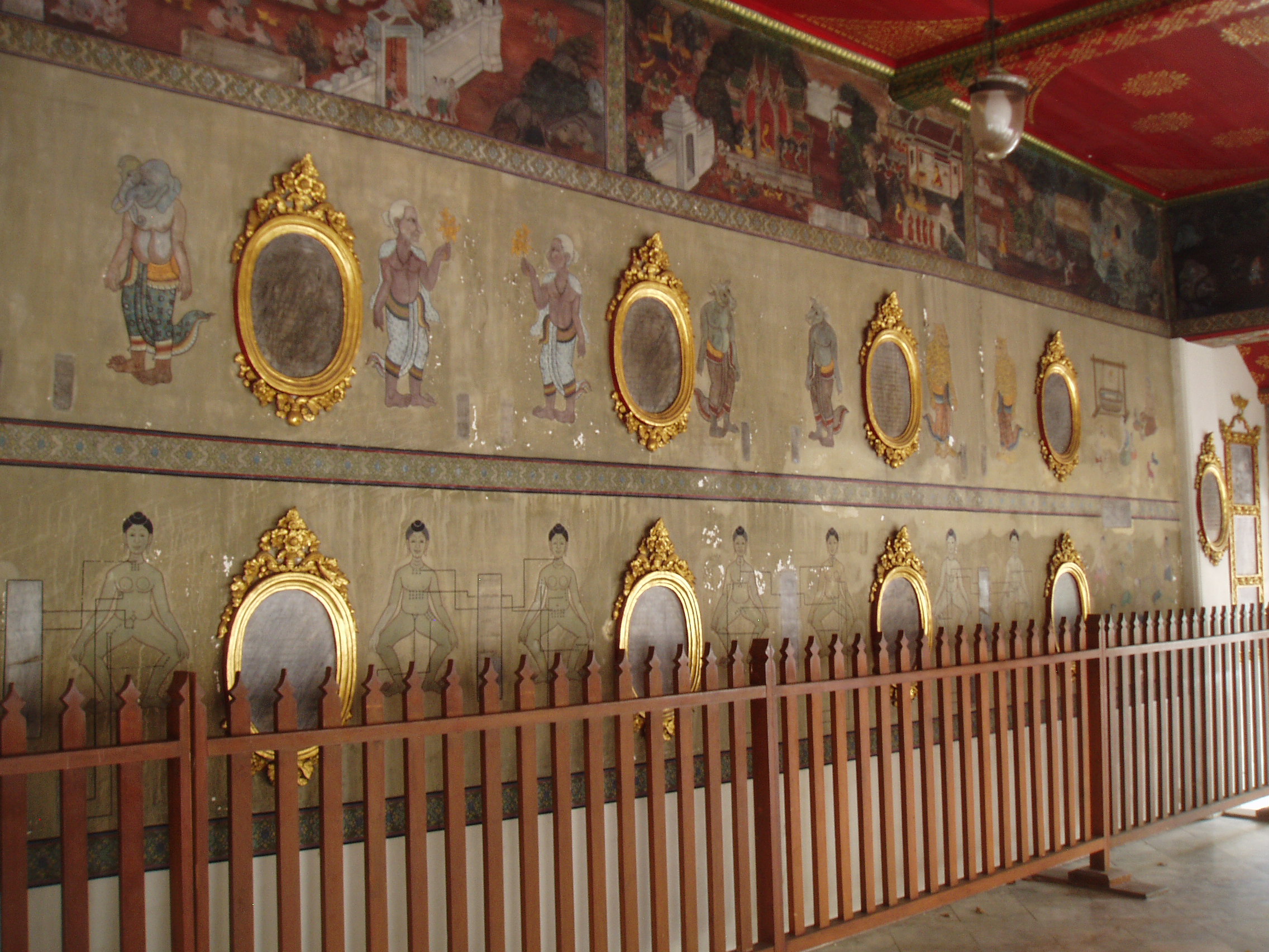 Medicine Pavilion, Wat Pho, Bangkok Wat Pho is the largest and oldest temple complex in Bangkok, and along with the temmple of the royal palace the most visited. The sprawling complex covers a huge area and it is quite easy to lose oneself within it's series of courtyards, gateways and stunning temple buildings. The present complex largely dates back to 1788, having been founded in response to the sacking of the former capital Ayutthaya by the Burmese in 1767 where a similar complex was destroyed. It is known as a place of learning and has a renowned school of Thai massage within the site. The temple complex is entered through one of many gateways guarded by huge Chinese statues, believed to have been imported as ballast on ships trading with China..The outer gates have fierce warrior figures, whilst the inner courtyards have the bizarre 'farang' ('foreigner') figures with their peculiar 'top hats', believed to represent the first European visitors to the east. Many of the inner courtyards are surrounded by a cloister containing over 400 sculptures of the seated Buddha, whilst the main Bot, the spiritual nucleus of the temple, is beautifully decorated within with frescoes of rich landscapes in red and gold. The biggest and most spectacular attraction of the temple however is the Hall of the Reclining Buddha, housing an enormous gilded recumbent figure of the Buddha over 160ft long, filling the entire centre of the chamber. en.wikipedia.org/wiki/Wat_Pho