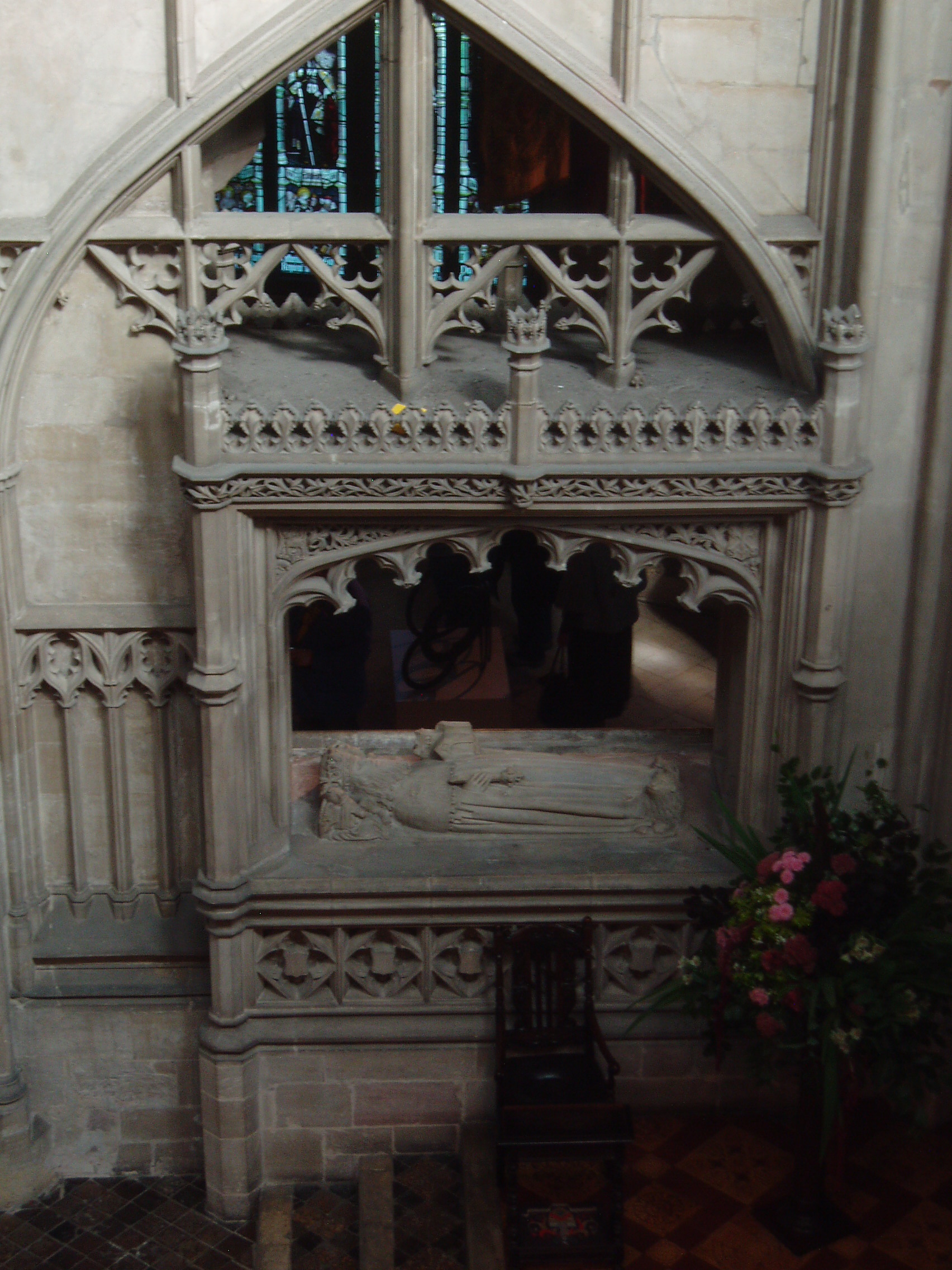 Prince Osric's Tomb, Gloucester Gloucester Cathedral is one of England's finest churches, a masterpiece of medieval architecture consisting of a uniquely beautiful fusion of Norman Romanesque and Perpendicular Gothic from the mid 14th century onwards. Until the Reformation this was merely Gloucester's Abbey of St Peter, under Henry VIII it became one of six former monastic churches to be promoted to cathedral status, thus saving the great church from the ravages of the Dissolution. The most obviously Norman part is the nave, immediately apparent on entering the building with it's round arches and thick columns (the exterior is the result of Gothic remodelling). Much of the remainder of the building is substantially the Norman structure also, but almost entirely modified in the later Middle Ages inside and out, the result of the great revenue brought to the abbey by pilgrims to the tomb of the murdered King Edward II in the choir. It was this transformation of the Norman church that is credited with launching the late gothic Perpendicular style in England. The gothic choir is a unique and spectacular work, the walls so heavily panelled as to suggest a huge stone cage (disguising the Norman arches behind) crowned by a glorious net-like vault adorned with numerous bosses (those over the Altar with superb figures of Christ and angels) whilst the east wall is entirely glazing in delicate stone tracery, and still preserving most of it's original 14th century stained glass. The soaring central tower, also richly panelled with delicate pinnacles, is another testament to the abbey's increasing wealth at this time. The latest medieval additions to the church are equally glorious, the Lady Chapel is entered through the enormous east window and is itself a largely glazed structure, though the original glass has been reduced to a few fragments in the east window, the remainder now contains beautiful Arts & Crafts stained glass by Christopher and Veronica Whall. The early 16th century cloisters to the north of the nave are some of the most beautiful anywhere, being completely covered by exquisite fan vaulting, with a seperate lavatorium (washing room) attached to the north walk as a miniature version of the main passages. There is much more of interest, from 14th century choir stalls with misericords to the comprehensive collection of tombs and monuments of various dates, including the elaborate tomb of Edward II and that of Robert Duke of Normandy, eldest son of William the Conqueror. The stained glass also represents all ages, from the 14th century to the striking contemporary windows by Tom Denny. Further areas of the cathedral can be accessed at certain times, such as the Norman crypt under the choir and the triforium gallery above. My visit coincided with the major 'Crucible' exhibition of contemporary sculpture (September-October 2010), examples of which I will upload in due course.