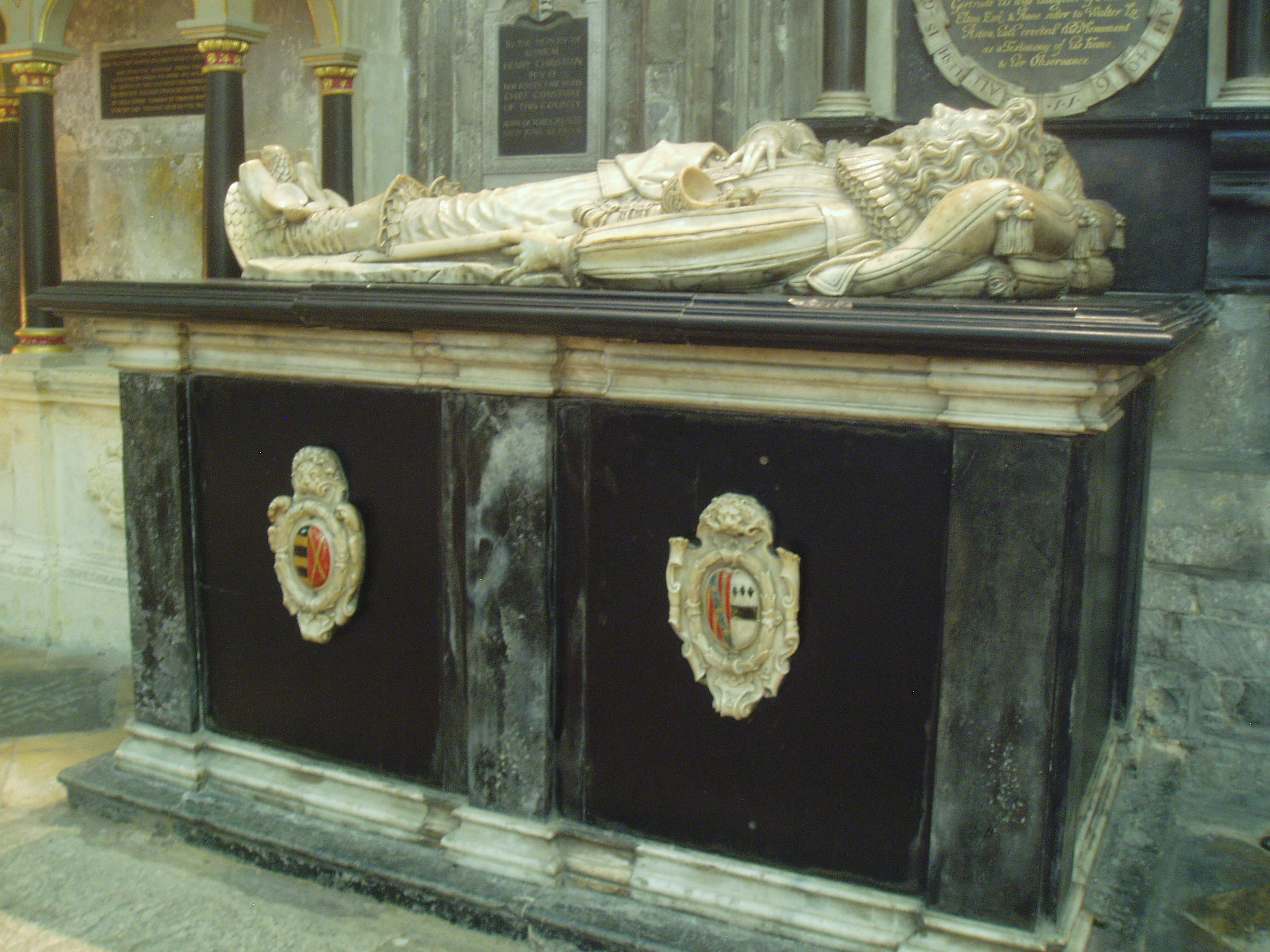 Abraham Blackleech Tomb 1639 The tomb of Abraham & Gertrude Blackleech in the south transept at Gloucester. The monument dates from 1639 and is the work of an unknown highly skilled sculptor, similar to the work of Nicholas Stone. Gloucester Cathedral is one of England's finest churches, a masterpiece of medieval architecture consisting of a uniquely beautiful fusion of Norman Romanesque and Perpendicular Gothic from the mid 14th century onwards. Until the Reformation this was merely Gloucester's Abbey of St Peter, under Henry VIII it became one of six former monastic churches to be promoted to cathedral status, thus saving the great church from the ravages of the Dissolution. The most obviously Norman part is the nave, immediately apparent on entering the building with it's round arches and thick columns (the exterior is the result of Gothic remodelling). Much of the remainder of the building is substantially the Norman structure also, but almost entirely modified in the later Middle Ages inside and out, the result of the great revenue brought to the abbey by pilgrims to the tomb of the murdered King Edward II in the choir. It was this transformation of the Norman church that is credited with launching the late gothic Perpendicular style in England. The gothic choir is a unique and spectacular work, the walls so heavily panelled as to suggest a huge stone cage (disguising the Norman arches behind) crowned by a glorious net-like vault adorned with numerous bosses (those over the Altar with superb figures of Christ and angels) whilst the east wall is entirely glazing in delicate stone tracery, and still preserving most of it's original 14th century stained glass. The soaring central tower, also richly panelled with delicate pinnacles, is another testament to the abbey's increasing wealth at this time. The latest medieval additions to the church are equally glorious, the Lady Chapel is entered through the enormous east window and is itself a largely glazed structure, though the original glass has been reduced to a few fragments in the east window, the remainder now contains beautiful Arts & Crafts stained glass by Christopher and Veronica Whall. The early 16th century cloisters to the north of the nave are some of the most beautiful anywhere, being completely covered by exquisite fan vaulting, with a seperate lavatorium (washing room) attached to the north walk as a miniature version of the main passages. There is much more of interest, from 14th century choir stalls with misericords to the comprehensive collection of tombs and monuments of various dates, including the elaborate tomb of Edward II and that of Robert Duke of Normandy, eldest son of William the Conqueror. The stained glass also represents all ages, from the 14th century to the striking contemporary windows by Tom Denny. Further areas of the cathedral can be accessed at certain times, such as the Norman crypt under the choir and the triforium gallery above. www.gloucestercathedral.org.uk/ My visit coincided with the major 'Crucible' exhibition of contemporary sculpture (September-October 2010), examples of which I will upload in due course.