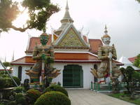 Temple Guardians, Wat Arun, Bangkok The Ordination Hall guarded by Yaksha giants (benign demons) in the precinct of Wat Arun (Temple of Dawn) on Bangkok's west bank. en.wikipedia.org/wiki/Wat_Arun