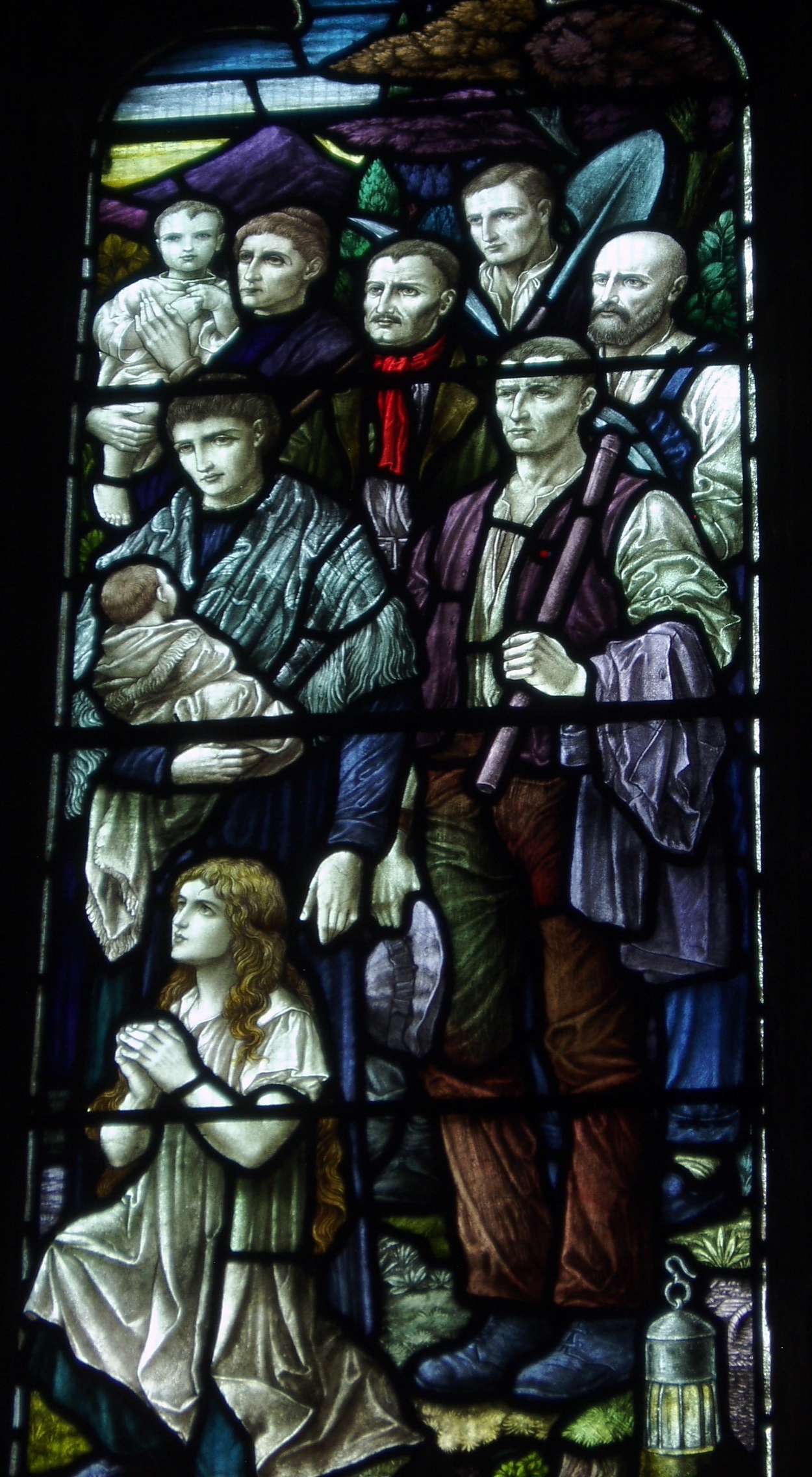 Miners & Families, Ibstock East window of the north aisle at Ibstock by Heaton, Butler & Bayne, c1918, a memorial to those lost in the Great War and depicting people from all backgrounds who made sacrifices during it. The church of St Denis stands in semi isolation on the fringe of the large village of Ibstock. It is an impressive building dating mainly from the 14th century, dominated by a sturdy steeple at the west end. Inside there is a good mixture of glass from late 19th to mid 20th century dates and the building is clearly well used and cared for. The church is normally locked outside of services, but we were given an especially warm welcome here by the ladies on stewarding duty whilst the church was open for the day. www.leicestershirechurches.co.uk/ibstock-st-denys/
