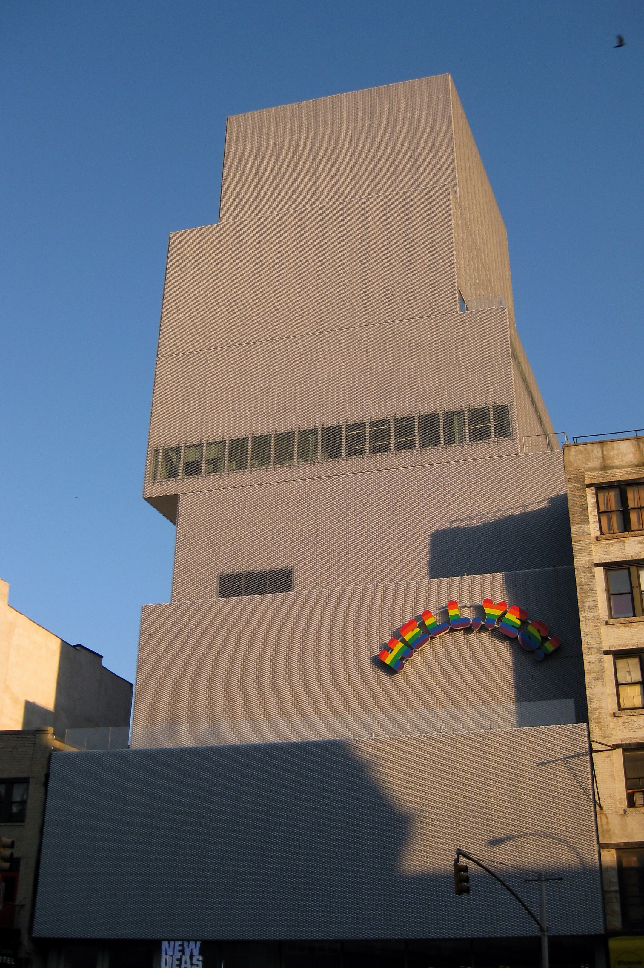 NYC - LES: The New Museum The New Museum, founded as the New Museum of Contemporary Art by Marcia Tucker in 1977, is the only museum in New York City exclusively devoted to presenting contemporary art from around the world. On December 1, 2007, the New Museum opened its first freestanding, dedicated building at 235 Bowery. The building, designed by Kazuyo Sejima and Ryue Nishizawa/SANAA with Gensler, New York, serving as Executive Architect, is expressed as a series of six asymetrically stacked aluminium-clad rectilinear boxes shifted off-axis around a central steel core. Sejima + Nishizawa's inspiration came from the traditional set-backs exhibited by some of the city's earlier skyscrapers. The façade is shrouded in 3,270 square metres of expanded aluminium, originally developed in the United Kingdom as a means of reinforcing roads. It was the first time this medium has been employed in the United States. The basement of the New Museum features a 188-seat theatre.