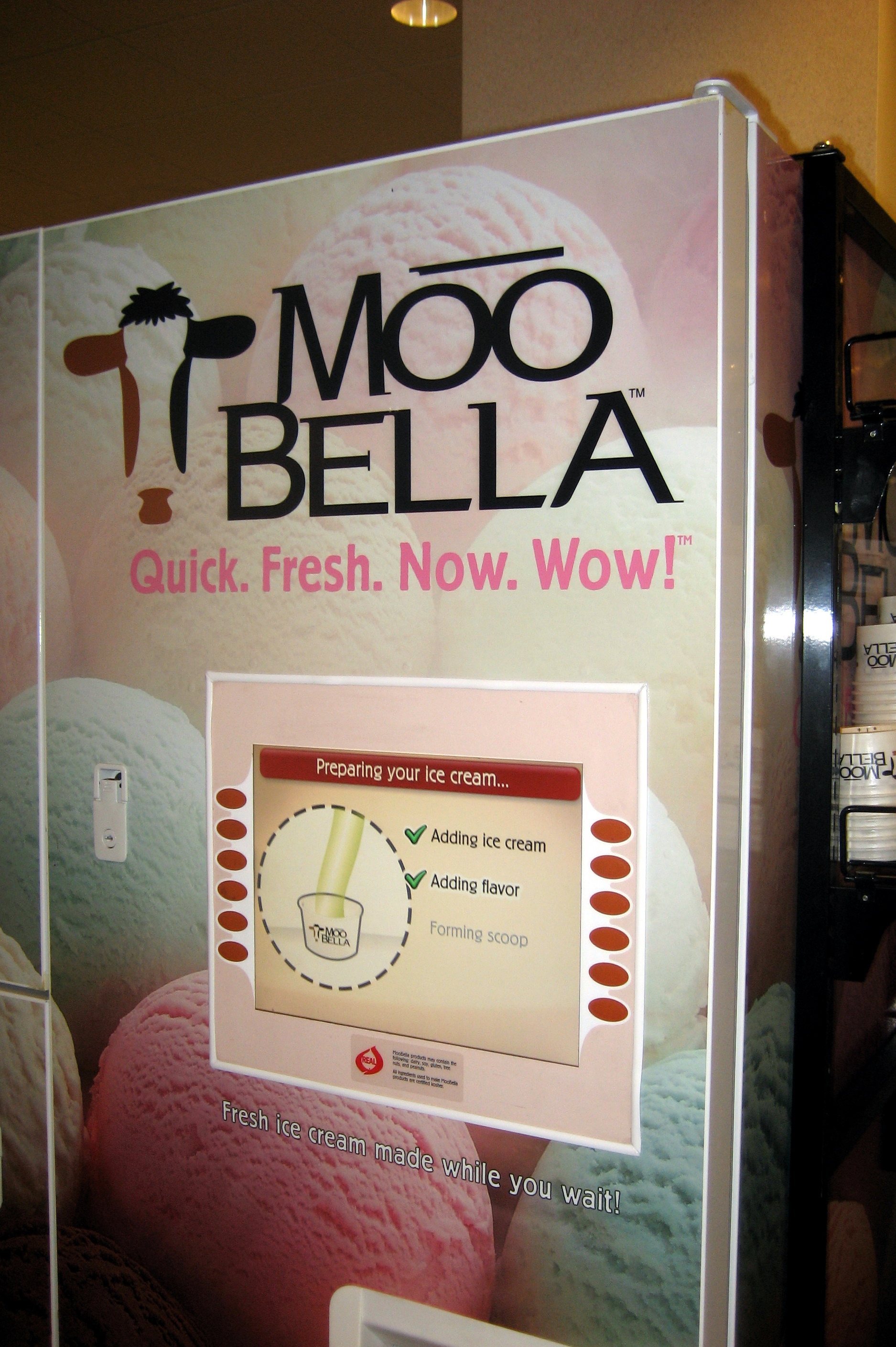 Boston - Boston University - George Sherman Union - Moo Bella machine The MooBella Ice Cream System produces a wide variety of creamy, delicious, hard-packed ice cream flavors made fresh to order in approximately 45 seconds. Consumers select the type of ice cream (currently premium or light, but soy and yogurt are coming soon), flavor (with 12 to choose from) and a mix-in (such as chocolate chips, M&M’s, walnuts, and cookies & creme) of their choice and the machine produces a 4.5 ounce scoop of mouth-watering ice cream. It tastes just so so.