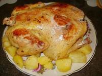 Курица, фаршированная картофелем, в мультиварке