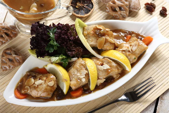 Тушеный карп с овощами