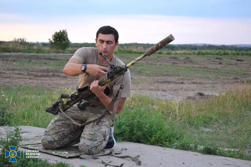 Ликвидированный ополченцами снайпер полковник СБУ Денис Волочаев