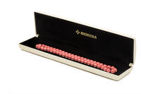 розовые в коробке