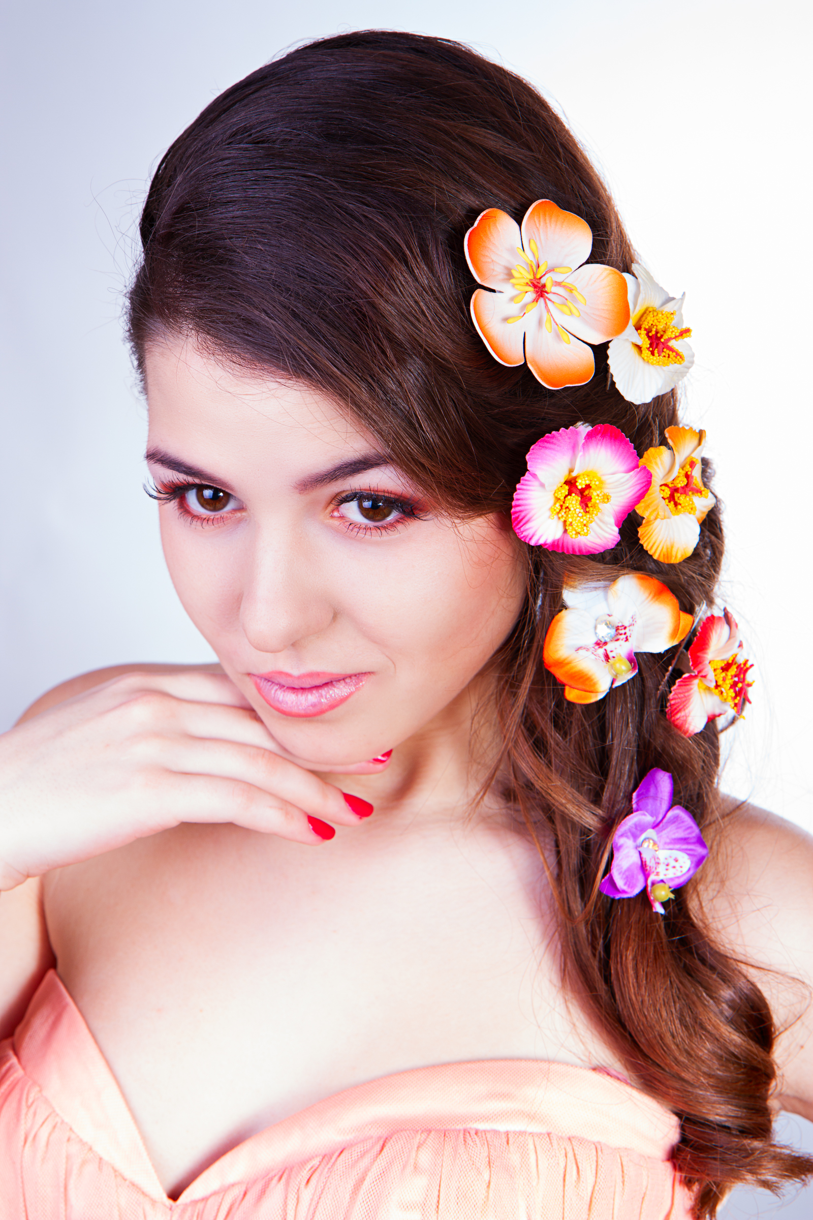 beautiful young woman with flowers in hair