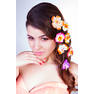 beautiful young woman with flowers in hair