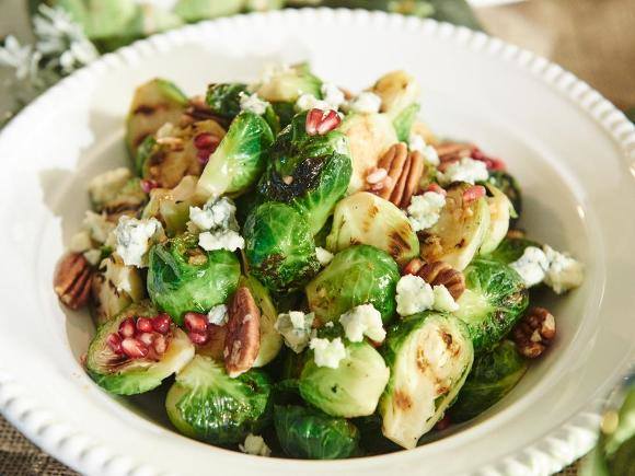 Grilled Brussels Sprout Salad with Pecans Pomegranates and Blue Cheese