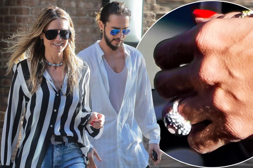 PAY-Television-personality-and-model-Heidi-Klum-is-seen-wearing-an-engagement-ring-while-stepping-out-wi