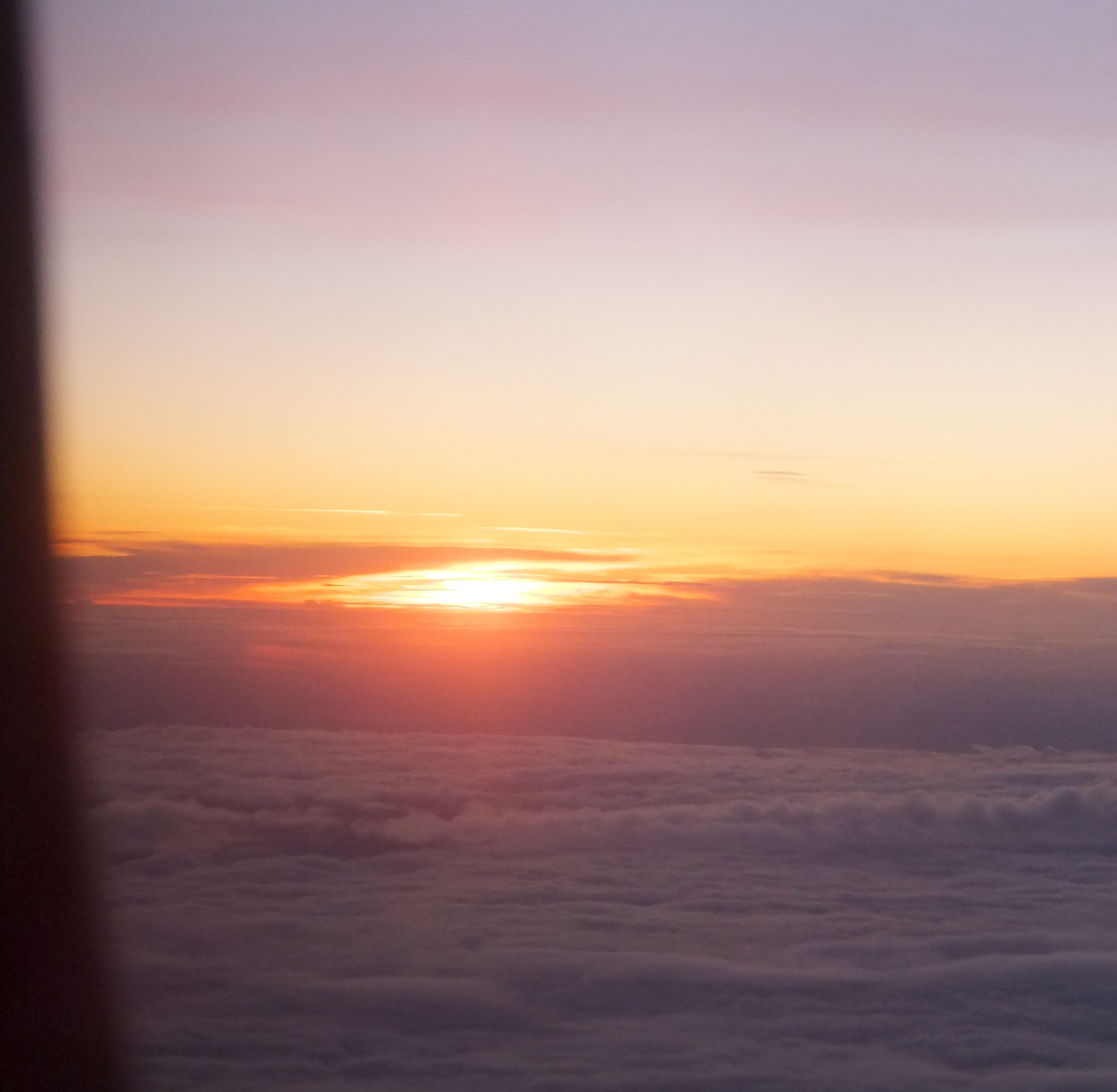 Sunrise out of the plane window