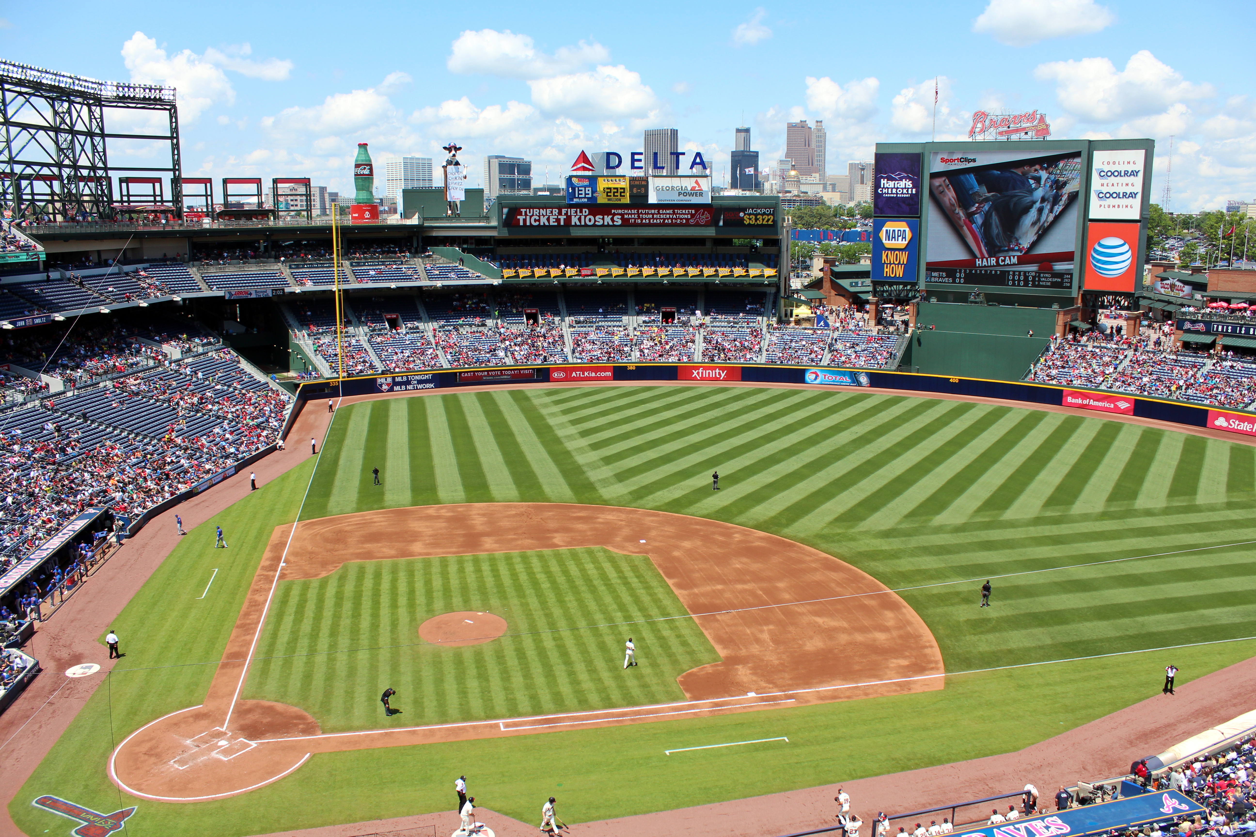 Atlanta - Turner Field Turner Field originally opened as the 85,000-seat Centennial Olympic Stadium in 1996 to serve as the centerpiece of the 1996 Summer Olympics, after which it was converted into a 49,000-seat baseball park. Since 1997 it has served as the home of the Atlanta Braves of Major league baseball.