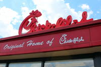 Hapeville: Chick-fil-A at Hapeville Dwarf House Chick-fil-A at Hapeville Dwarf House was first opened by Truetty Cathy in 1946 as The Dwarf Grill. It was here that Cathy invented the Chick-fil-A's boneless breast of chicken sandwich. In 1961 after finding a pressure-fryer that could cook the chicken sandwich in the same amount of time to cook a fast food hamburger, Cathy registered the name Chick-fil-A, Inc. and starting with a restaurant at a mall in suburban Atlanta in 1967 began to expand throughout the region. Today there are more than 1600 locations across 38 states. The Hapeville Dwarf House is one of 11 Dwarf House locations around Atlanta, all of which, unlike other Chick-fil-a locations, offer a full-service menu in addition to fast-food service. It features an extra small-sized front door and a motorized display of the seven dwarfs in the back.