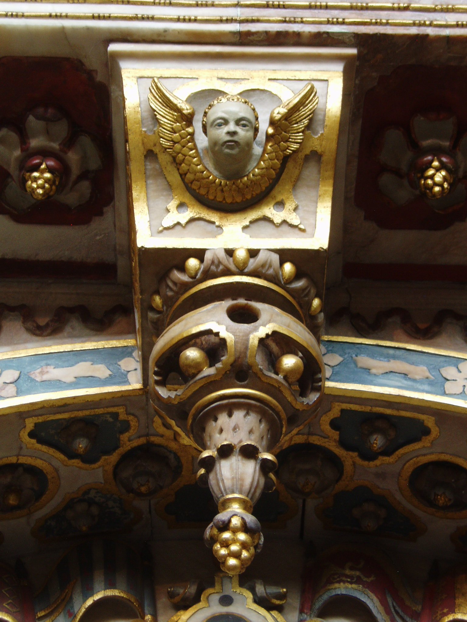 Cherub, Dudley Monument On the north side of the Beauchamp chapel is this large and impressive monument marking the burial place of Elizabeth I's favourite, Robert Dudley, Earl of Leicester, who died in 1588. (His older brother Ambrose, Earl of Warwick lies nearby) Robert had an interesting role in the Court of Queen Elizabeth, who once even put him forward as a potential husband for Mary Queen of Scots. He was also under suspicion of killing his first wife, Amy Robsart, in order to make himself available for potentail marriage to the Queen. Regardless of this Elizabeth favoured him highly, and never forgave him for remarrying to Lettice Knollys (a great niece of Anne Boleyn) who lies buried here beside him. For further information about Robert Dudley's colourful career click the following en.wikipedia.org/wiki/Robert_Dudley,_1st_Earl_of_Leicester
