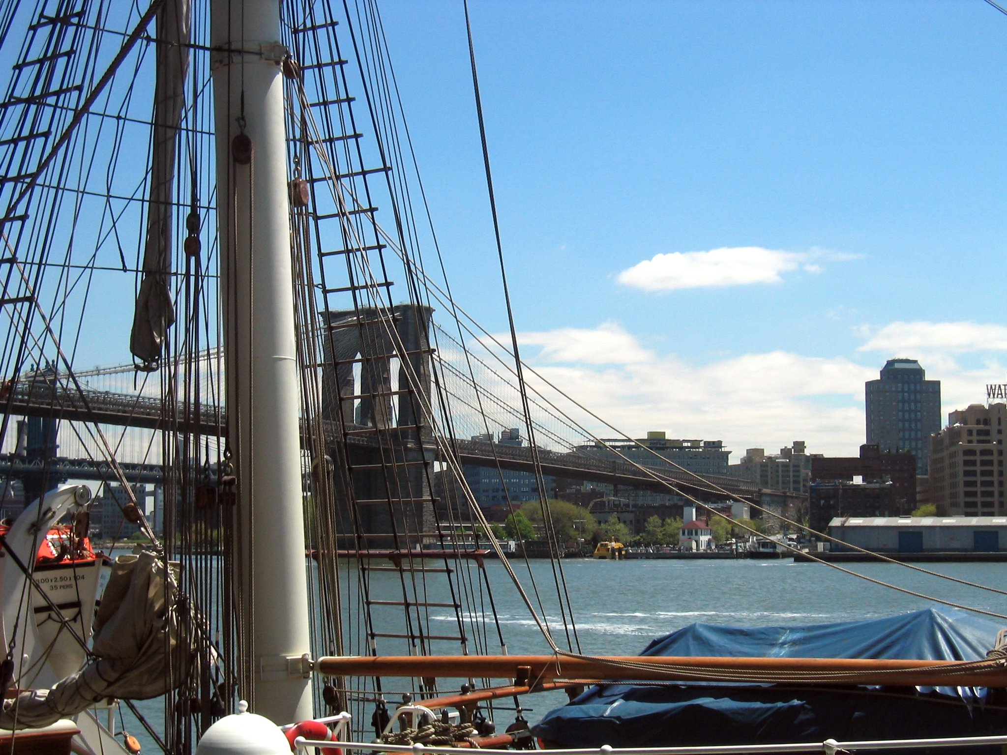 Brooklyn Bridge - A View from the Seaport1 For more information on the Brooklyn Bridge, see this picture. For more of my pictures of the Brooklyn Bridge, click here. This picture was taken from within the South Street Seaport Hisoric District and Extension, which was designated a historic district by the New York City Landmarks Preservation commission in 1977 and 1989. The Brooklyn Bridge was designated a landmark by the New York Landmarks Preservation Commission in 1967. Brooklyn Bridge National Register #66000523 South Street Seaport National Register #72000883 South Street Seaport Historic District National Register #72000884