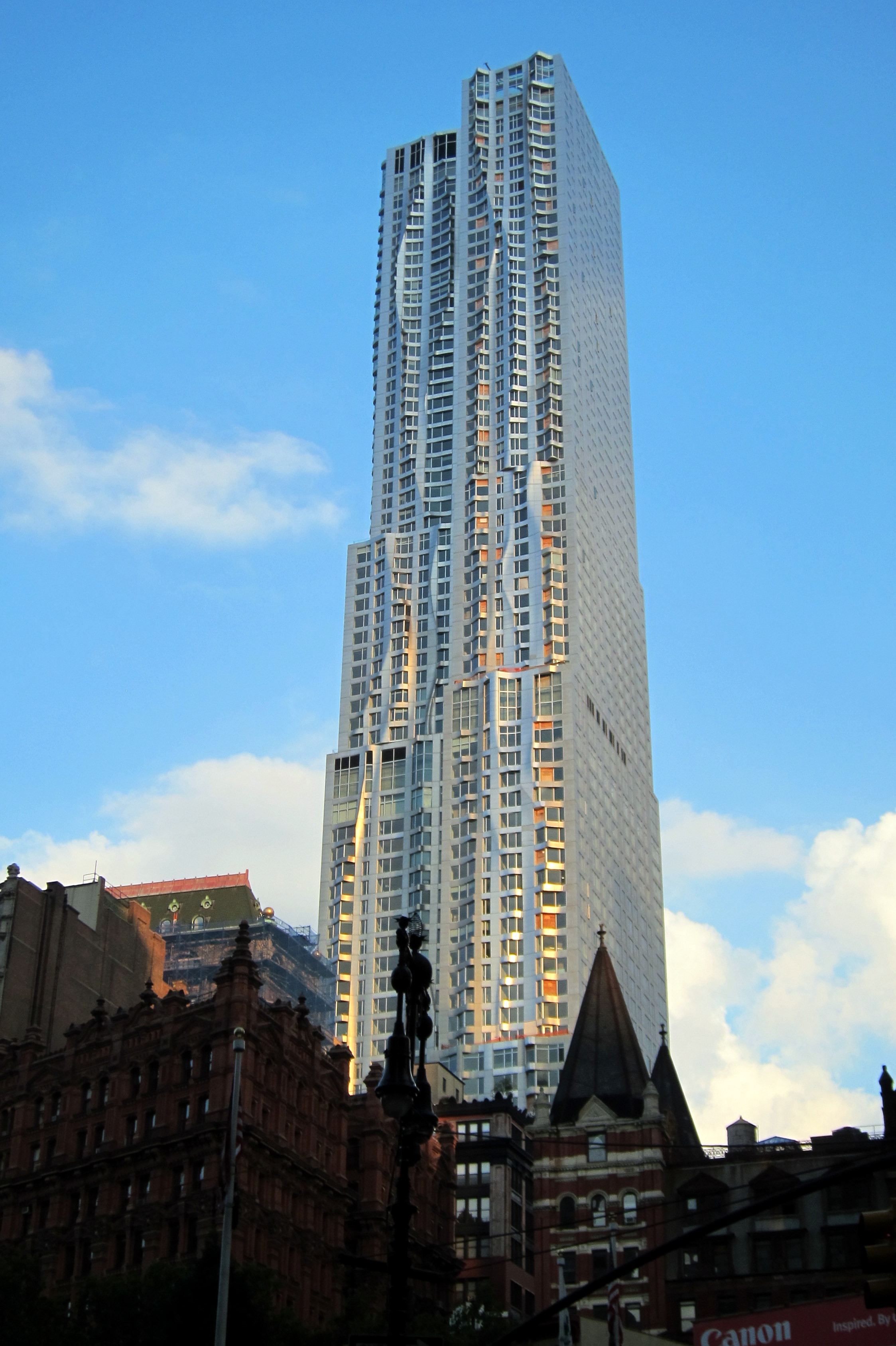 NYC - Civic Center: 8 Spruce Street 8 Spruce Street, formerly the Beekman Tower, is a 76-story skyscraper (under construction here, as of 2010) developed by Forest City Ratner and designed by Frank Gehry. Slated to open in 2010, it will contain a public elementary school, owned by the Department of Education, as well as 903-units of luxury rentals, space for the ew York Downtown Hospital, and other street level retail.