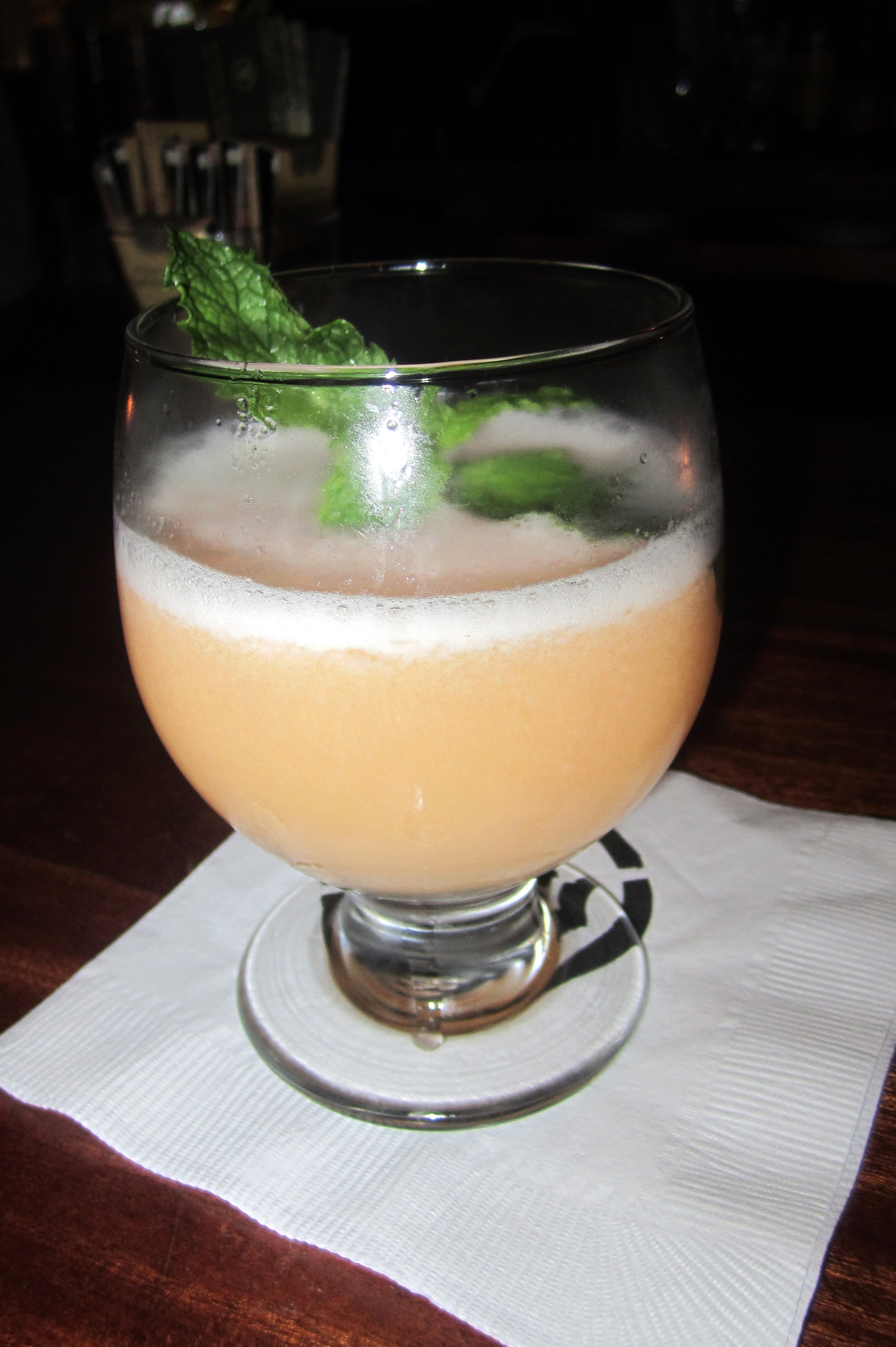 NYC - TriBeCa: Macao Trading Co - Bashful Maiden Hendrick's Gin shaken with St. Germain Elderflower Liquer, Velvet Falernum, Lemon Juice & Pureed STriped Melon, served straight up. Macao Trading Co, at 311 Church Street, was opened in 2008 by the team from Employees Only, David Waltuck, chef-owner of Chanterelle , and his sous-chef Keith Harry. The bi-level Tribeca space features food from Macao, a Portuguese colony in China with heavy African and Indian influences.