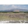 Pyramids of Teotihuacan Teotihuacan is one of the most famous and important sites of ancient Mexico, best known for it's enormous Avenue of the Dead and the great pyramids of the Sun and Moon. Although the site was known in Aztec times as the 'Birthplace of the Gods' it is actually significantly older, with most of the major structures built between 100-250AD and the city, one of the largest ever ancient settlements in the Americas, was believed to have been still inhabited up to the 8th century. Today the vast scale of the complex, particularly the so called Avenue of the Dead, nearly 3km long and flanked by ancient ruins and terraces, continues to awe visitors. At the north end of the Avenue sits the Pyramid of the Moon, whilst it's much larger counterpart, the Pyramid of the Sun, sits halfway up it's eastern side. At the southern end sits the Ciudadela complex which centres on the smaller pyramid of Quetzelcoatl, earlier and more ruined than the larger pyramids but retaining it's stunning original sculptural decoration on part of it's western face, featuring the iconic feathered serpent heads. Aside from the great ceremonial structures there are also residential buildings, particularly the palatial complex at the north west corner that retains some vivid fragments of it's original mural decoration. en.wikipedia.org/wiki/Teotihuacan